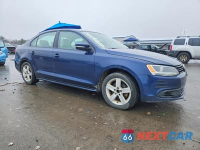 Czwarte zdjęcie samochodu z boku: 2014 VOLKSWAGEN JETTA TDI VIN:3VWLL7AJ0EM361508 - miniatura