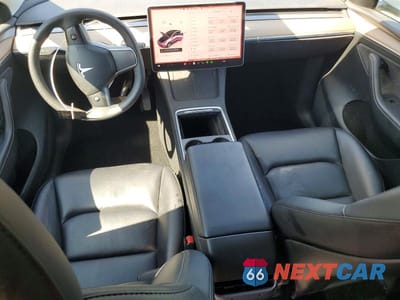 Zdjęcie 8 z 14 samochodu: 2023 TESLA MODEL Y VIN:7SAYGDEE4PF622061 - miniatura
