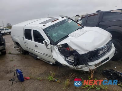 Czwarte zdjęcie samochodu z boku: 2014 GMC SIERRA K2500 DENALI VIN:1GT125E8XEF165598 - miniatura