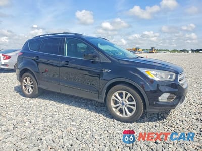 Czwarte zdjęcie samochodu z boku: 2018 FORD ESCAPE SEL VIN:1FMCU0HD6JUA37021 - miniatura
