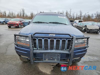 Piąte zdjęcie samochodu w środku: 2001 JEEP GRAND CHEROKEE LIMITED VIN:1J4GW58SX1C578326 - miniatura