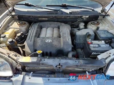 Zdjęcie 12 z 13 samochodu: 2003 HYUNDAI SANTA FE GLS VIN:KM8SC73D93U478210 - miniatura