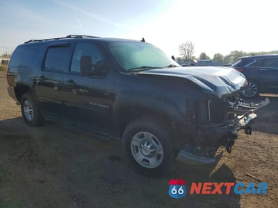 Czwarte zdjęcie samochodu z boku: 2011 CHEVROLET SUBURBAN K2500 LS VIN:1GNWKLEG6BR122928 - miniatura