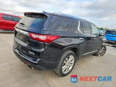 Trzecie zdjęcie samochodu z tyłu: 2018 CHEVROLET TRAVERSE HIGH COUNTRY VIN:1GNEVKKW4JJ109391 - miniatura