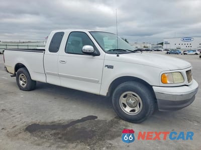 Czwarte zdjęcie samochodu z boku: 2003 FORD F150 VIN:1FTRX17213NA22256 - miniatura