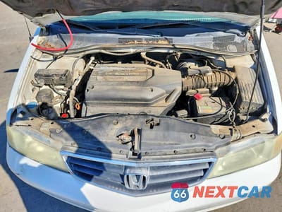 Zdjęcie 12 z 13 samochodu: 2003 HONDA ODYSSEY EXL VIN:5FNRL18043B094348 - miniatura