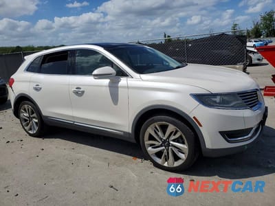Czwarte zdjęcie samochodu z boku: 2016 LINCOLN MKX RESERVE VIN:2LMTJ8LR2GBL66117 - miniatura