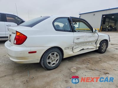 Trzecie zdjęcie samochodu z tyłu: 2003 HYUNDAI ACCENT GL VIN:KMHCG35C03U261988 - miniatura