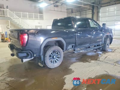 Trzecie zdjęcie samochodu z tyłu: 2023 GMC SIERRA K3500 AT4 VIN:1GT49VEY7PF197291 - miniatura