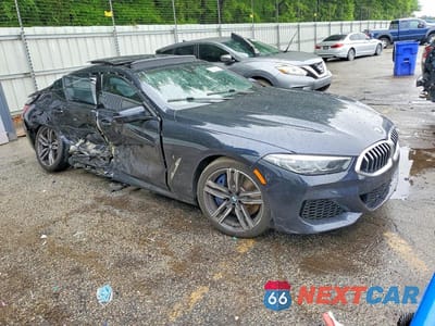 Czwarte zdjęcie samochodu z boku: 2020 BMW 840I VIN:WBAGV2C06LCD87499 - miniatura