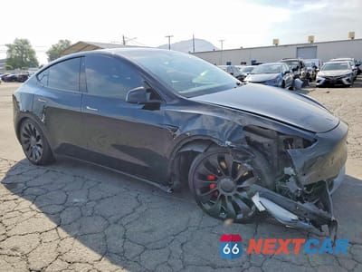 Czwarte zdjęcie samochodu z boku: 2022 TESLA MODEL Y VIN:7SAYGDEF2NF490780 - miniatura