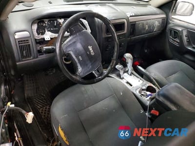 Zdjęcie 8 z 12 samochodu: 2002 JEEP GRAND CHEROKEE LAREDO VIN:1J4GW48S52C315852 - miniatura