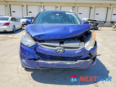 Piąte zdjęcie samochodu w środku: 2011 HYUNDAI TUCSON GLS VIN:KM8JU3AC0BU129124 - miniatura