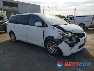 Czwarte zdjęcie samochodu z boku: 2012 TOYOTA SIENNA XLE 8-PASSENGER VIN:5TDYK3DC5CS265727 - miniatura