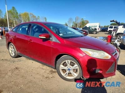 Czwarte zdjęcie samochodu z boku: 2013 FORD FOCUS VIN:1FADP3F26DL206361 - miniatura