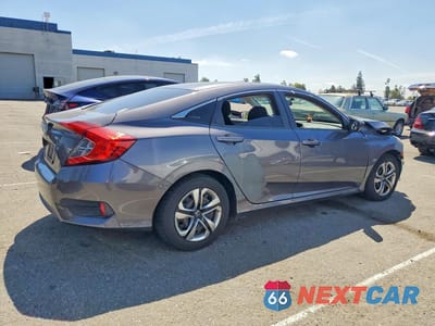 Trzecie zdjęcie samochodu z tyłu: 2018 HONDA CIVIC LX VIN:2HGFC2F54JH513511 - miniatura