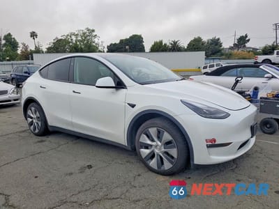Czwarte zdjęcie samochodu z boku: 2024 TESLA MODEL Y VIN:7SAYGAEE2RF054149 - miniatura