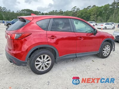 Trzecie zdjęcie samochodu z tyłu: 2016 MAZDA CX-5 TOURING VIN:JM3KE2CY2G0896634 - miniatura