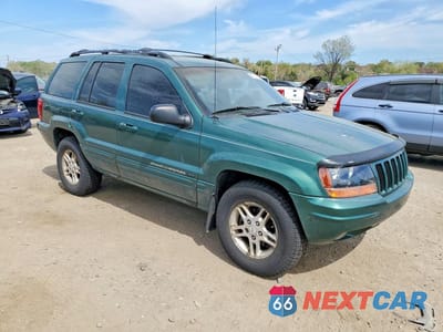 Czwarte zdjęcie samochodu z boku: 2000 JEEP GRAND CHEROKEE LIMITED VIN:1J4GW58S2YC140605 - miniatura