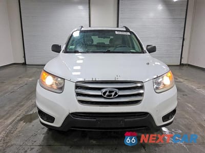 Piąte zdjęcie samochodu w środku: 2012 HYUNDAI SANTA FE GLS VIN:5XYZG3AB9CG142804 - miniatura