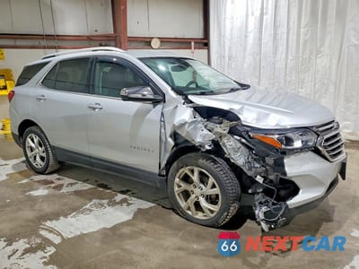 Czwarte zdjęcie samochodu z boku: 2018 CHEVROLET EQUINOX PREMIER VIN:3GNAXVEV4JL173582 - miniatura