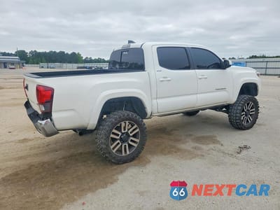 Trzecie zdjęcie samochodu z tyłu: 2021 TOYOTA TACOMA SR5 V6 VIN:3TMCZ5AN1MM411484 - miniatura