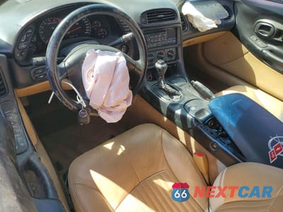 Zdjęcie 8 z 12 samochodu: 1999 CHEVROLET CORVETTE VIN:1G1YY22G3X5108880 - miniatura