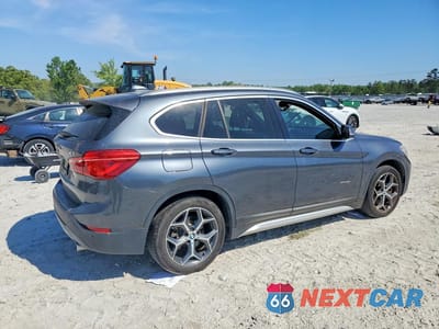 Trzecie zdjęcie samochodu z tyłu: 2016 BMW X1 XDRIVE28I VIN:WBXHT3C33G5E55882 - miniatura