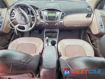 Zdjęcie 8 z 13 samochodu: 2010 HYUNDAI TUCSON GLS VIN:KM8JUCAC6AU053715 - miniatura