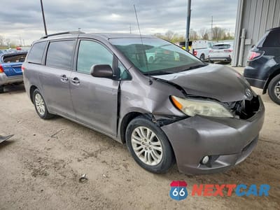 Czwarte zdjęcie samochodu z boku: 2014 TOYOTA SIENNA XLE 8-PASSENGER VIN:5TDYK3DC3ES512343 - miniatura