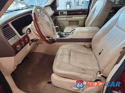 Zdjęcie 7 z 13 samochodu: 2004 LINCOLN NAVIGATOR VIN:5LMFU28RX4LJ30491 - miniatura