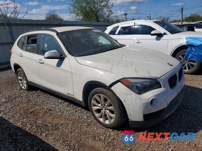 Czwarte zdjęcie samochodu z boku: 2013 BMW X1 XDRIVE28I VIN:WBAVL1C52DVR83876 - miniatura