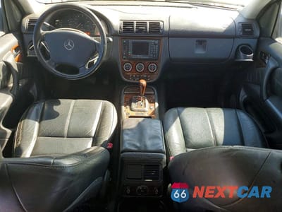 Zdjęcie 8 z 13 samochodu: 2002 MERCEDES-BENZ ML 500 VIN:4JGAB75E72A324616 - miniatura