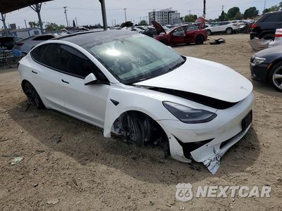 Czwarte zdjęcie samochodu z boku: 2022 TESLA MODEL 3 VIN:5YJ3E1EB9NF335765 - miniatura