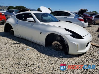 Czwarte zdjęcie samochodu z boku: 2014 NISSAN 370Z BASE VIN:JN1AZ4EH7EM636482 - miniatura