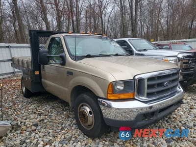 Czwarte zdjęcie samochodu z boku: 2001 FORD F350 SUPER DUTY FLATBED TRUCK VIN:1FDWF36F61EC22922 - miniatura