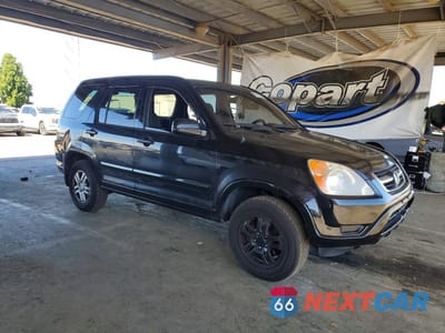 Czwarte zdjęcie samochodu z boku: 2004 HONDA CR-V EX VIN:JHLRD78874C019036 - miniatura