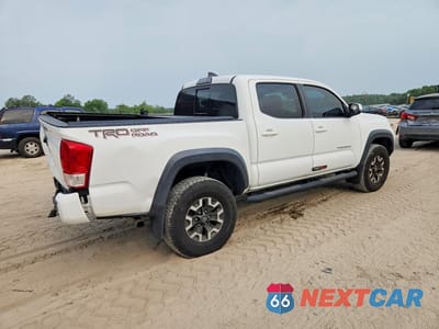 Trzecie zdjęcie samochodu z tyłu: 2019 TOYOTA TACOMA TRD OFF-ROAD VIN:3TMAZ5CN7KM083957 - miniatura