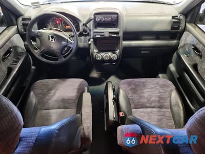 Zdjęcie 8 z 13 samochodu: 2004 HONDA CR-V LX VIN:SHSRD78434U205548 - miniatura