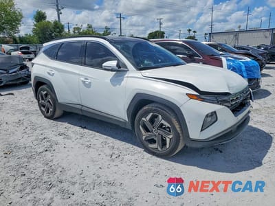 Czwarte zdjęcie samochodu z boku: 2023 HYUNDAI TUCSON LIMITED VIN:5NMJE3AE1PH258250 - miniatura