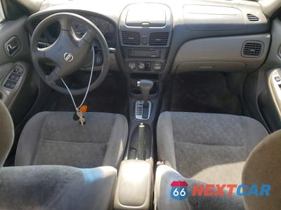 Zdjęcie 8 z 12 samochodu: 2003 NISSAN SENTRA XE VIN:3N1CB51D03L808025 - miniatura