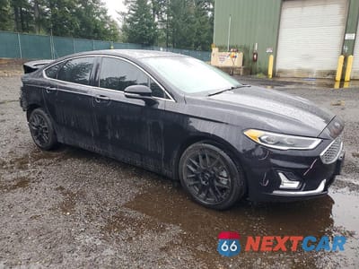Czwarte zdjęcie samochodu z boku: 2019 FORD FUSION TITANIUM VIN:3FA6P0SU4KR177729 - miniatura
