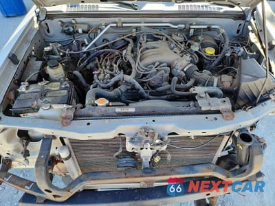 Zdjęcie 11 z 12 samochodu: 2004 NISSAN FRONTIER KING CAB XE V6 VIN:1N6ED26Y14C461101 - miniatura