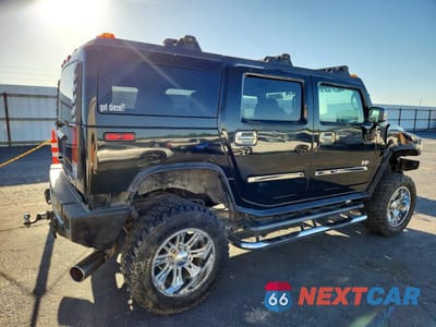 Trzecie zdjęcie samochodu z tyłu: 2003 HUMMER H2 VIN:5GRGN23U13H107489 - miniatura