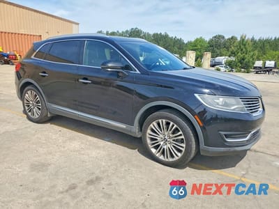 Czwarte zdjęcie samochodu z boku: 2017 LINCOLN MKX RESERVE VIN:2LMPJ8LR7HBL52667 - miniatura