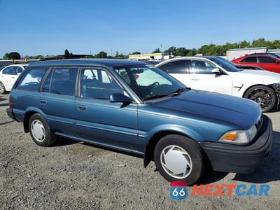 Czwarte zdjęcie samochodu z boku: 1992 TOYOTA COROLLA DELUXE VIN:JT2AE94K3N3499106 - miniatura