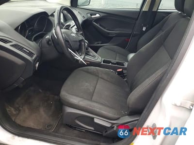 Zdjęcie 7 z 12 samochodu: 2017 FORD FOCUS SEL VIN:1FADP3H21HL207386 - miniatura