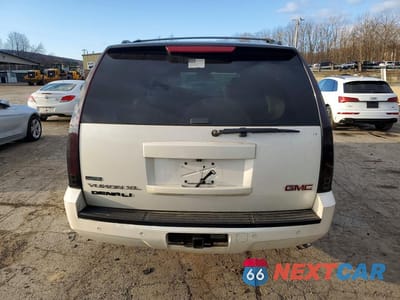 Zdjęcie 6 z 12 samochodu: 2010 GMC YUKON XL K1500 SLT VIN:1GKUKKE33AR281903 - miniatura