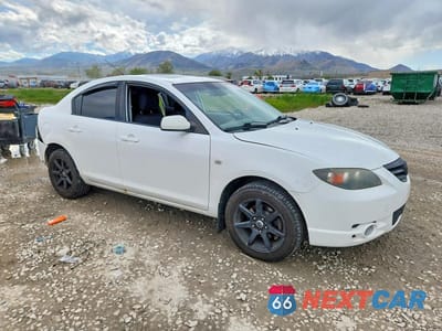 Czwarte zdjęcie samochodu z boku: 2005 MAZDA 3 S VIN:JM1BK123451251654 - miniatura