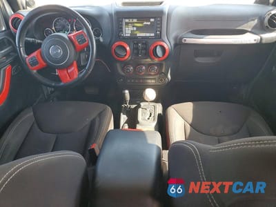 Zdjęcie 8 z 12 samochodu: 2013 JEEP WRANGLER UNLIMITED SAHARA VIN:1C4BJWEG7DL662953 - miniatura